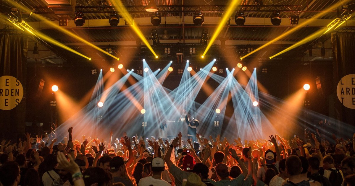 Music festival crowd and stage for a first-timer Europe festival guide.