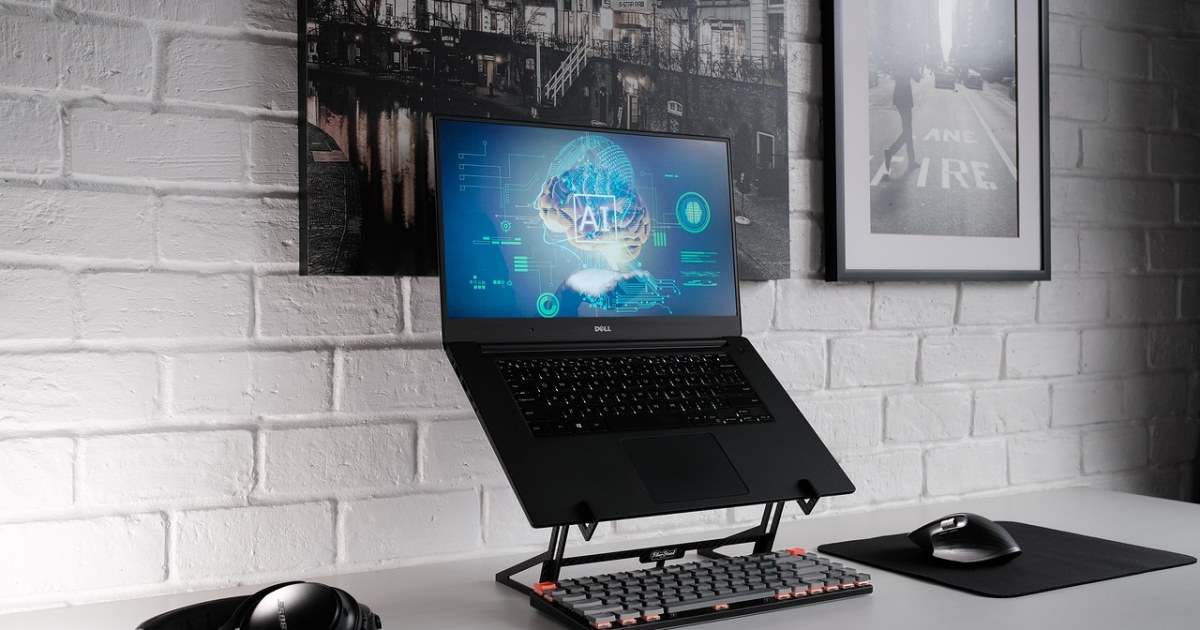 Laptop workspace for an AI productivity assistant comparison.