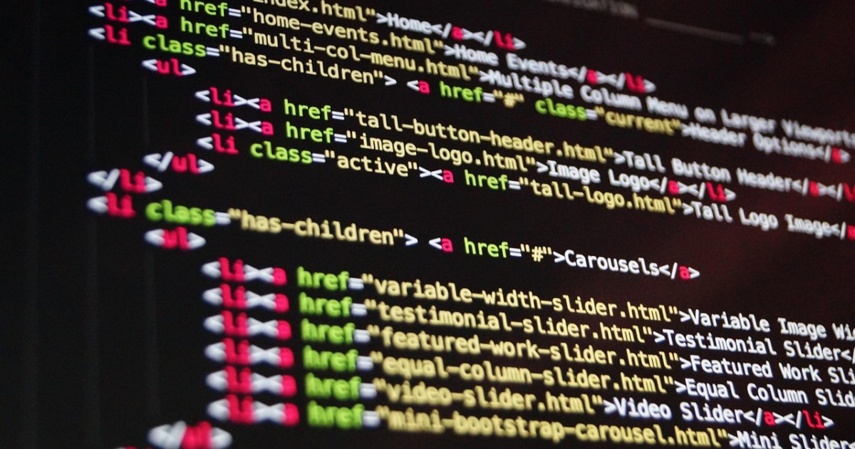 Code on a laptop for an AI software tools explainer.