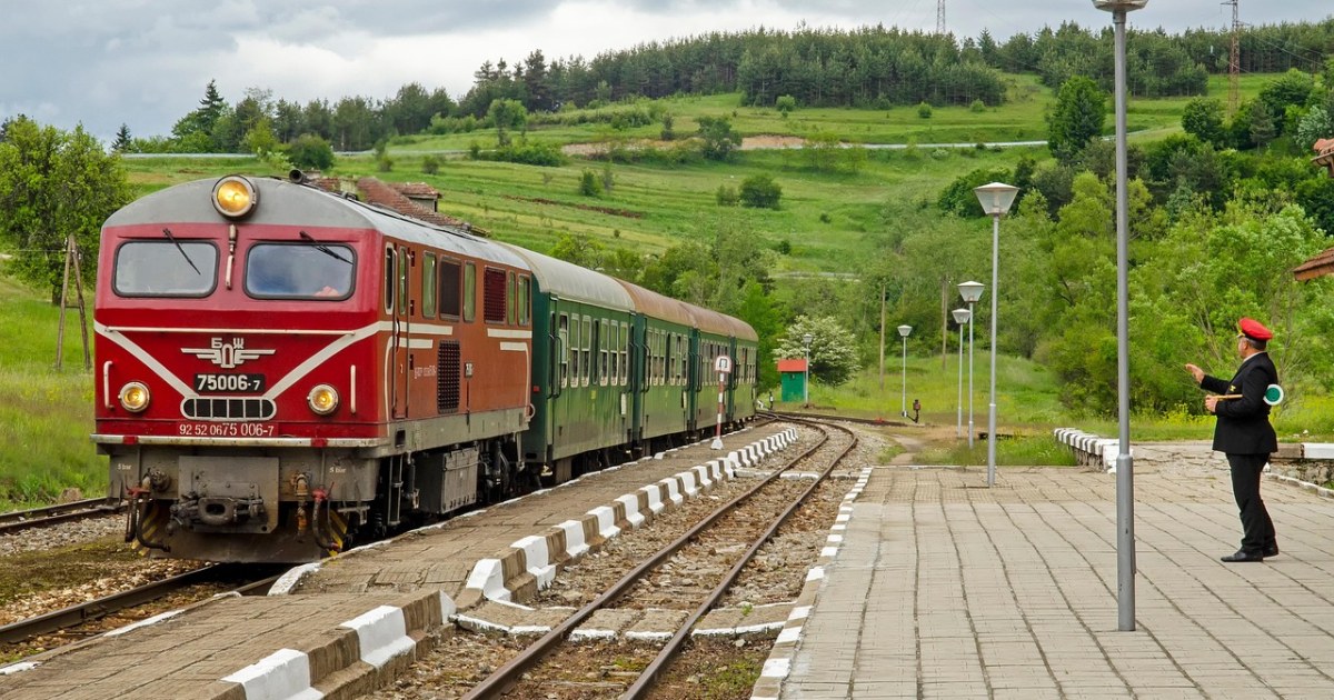 European train at a railway station for a Eurail route break-even guide.