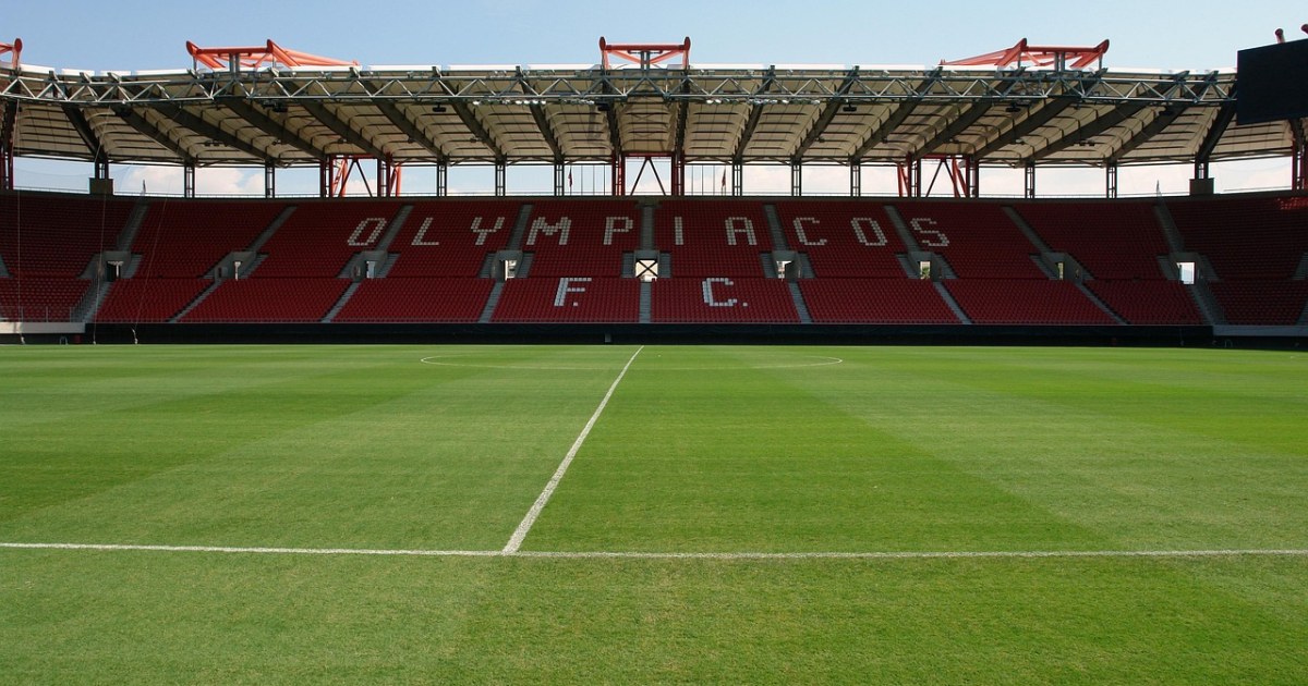 Football stadium crowd for a first-time match travel guide.