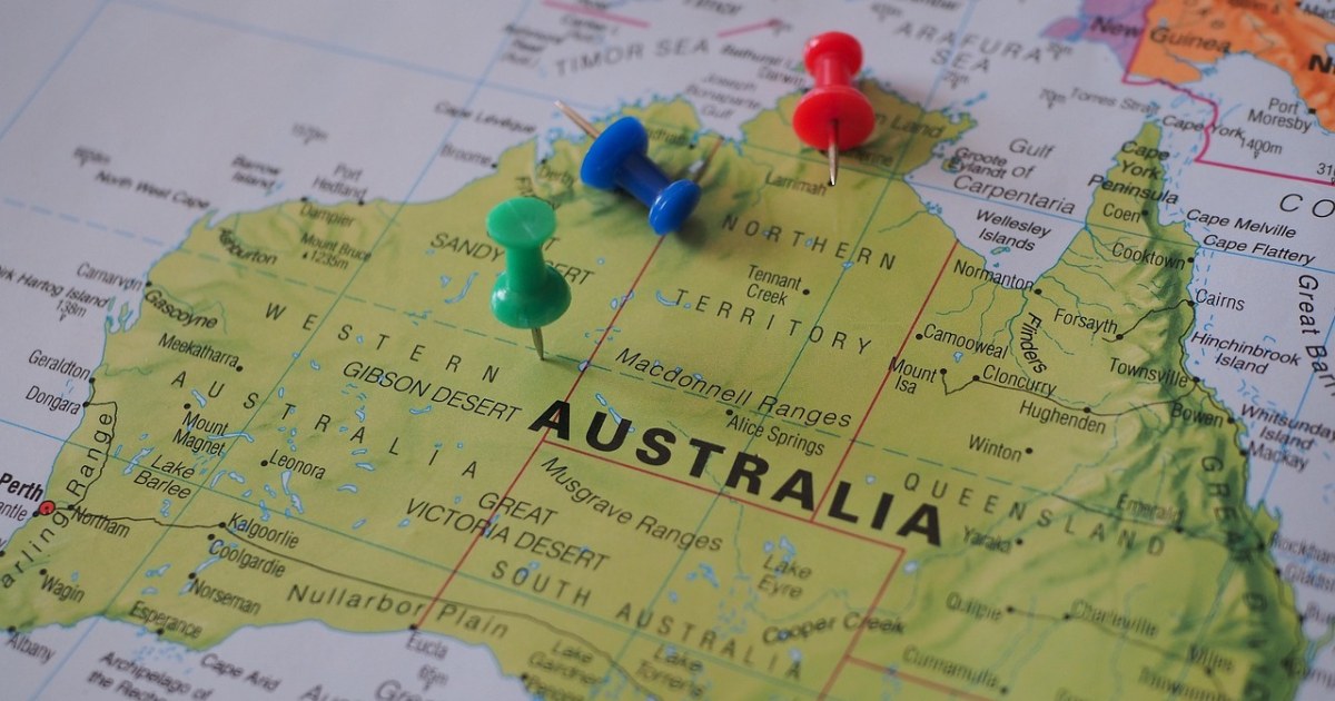 Map and travel planning desk for choosing a destination by trip type.